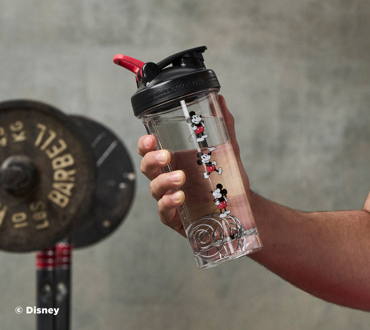 pro-series-s0 Mickey_Mouse_Protein_Shaker_Bottle_Being_Held_In_the_Gym.jpg
